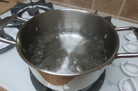 Rolling boil water in a pot